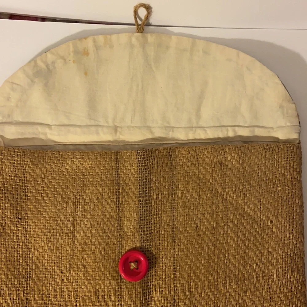 It’s a wrap burlap bag with sugar skulls, laptop bag, accessory bag